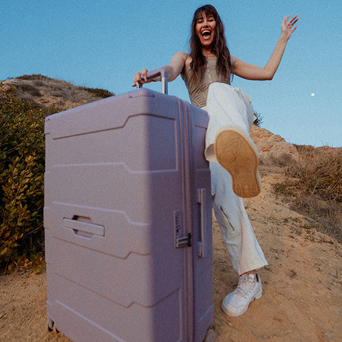 Velký cestovní kufr na kolečkách Heys ReNew L Evergreen