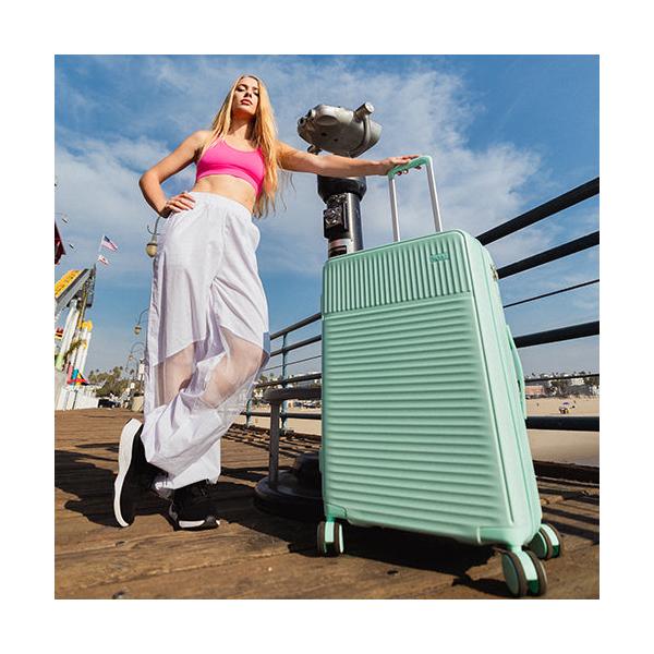 Velký skořepinový kufr na kolečkách Heys Pastel L Light Blue